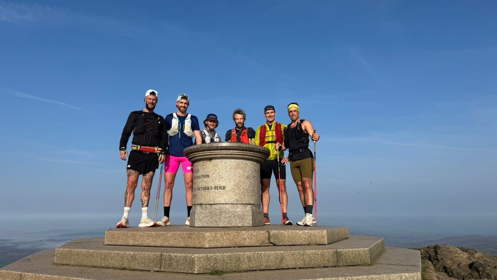 group of ultrarunners training together in mountains showing teamwork in ultrarunning