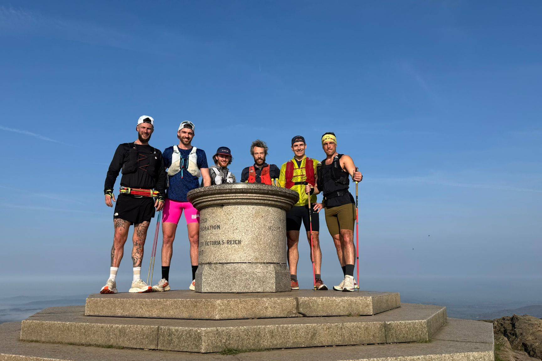 group of ultrarunners training together in mountains showing teamwork in ultrarunning