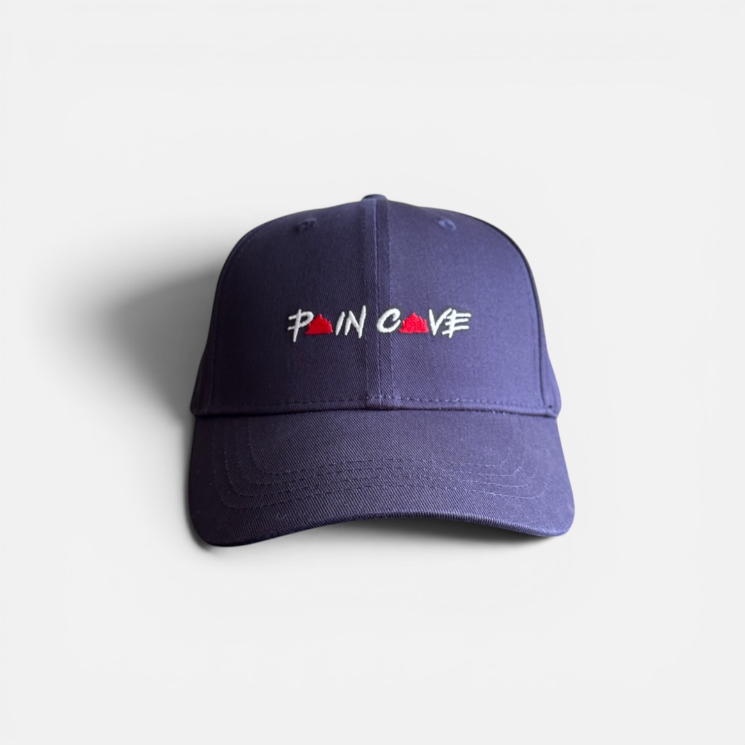 Pain Cave french navy snapback cap with embroidered logo
